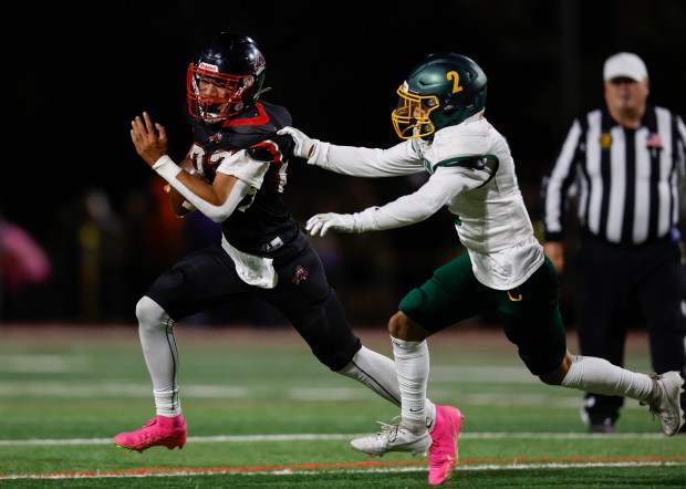 Aragon's Ivanhoe Nisa (23) is tackled by Capuchino's Joe Tressitte (2) in the second quarter at Aragon High School in San Mateo, Calif., on Thursday, Oct. 26, 2023. (Nhat V. Meyer/Bay Area News Group)