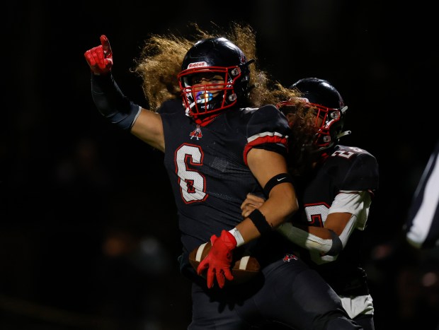 Aragon's Amaziah Tanielu (6) celebrates his touchdown against Capuchino High School in the fourth quarter at Aragon High School in San Mateo, Calif., on Thursday, Oct. 26, 2023. (Nhat V. Meyer/Bay Area News Group)