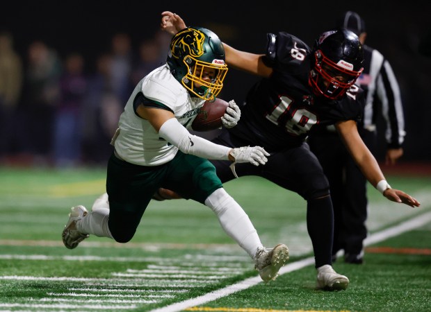 Capuchino's Cameron Chin (4) is forced out-of-bounds by Aragon's Hema Tonga (18) in the fourth quarter at Aragon High School in San Mateo, Calif., on Thursday, Oct. 26, 2023. (Nhat V. Meyer/Bay Area News Group)