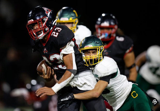 Aragon's Ivanhoe Nisa (23) is tackled by Capuchino's Issa Keishk (3) in the third quarter at Aragon High School in San Mateo, Calif., on Thursday, Oct. 26, 2023. (Nhat V. Meyer/Bay Area News Group)