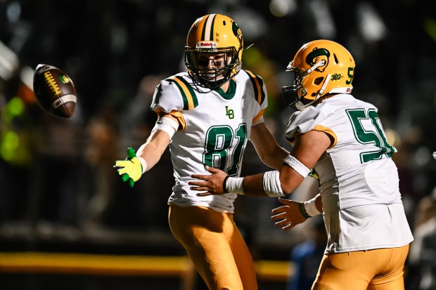 Live Oak's Robbie Rael (81) celebrates after a touchdown scored by Live Oak's Tanner Holeman (5) during the 1st half of the Live Oak vs Christopher BVAL high school football game at Christopher High School in Gilroy, Calif., on Friday, Nov. 3, 2023. (Thien-An Truong for Bay Area News Group)