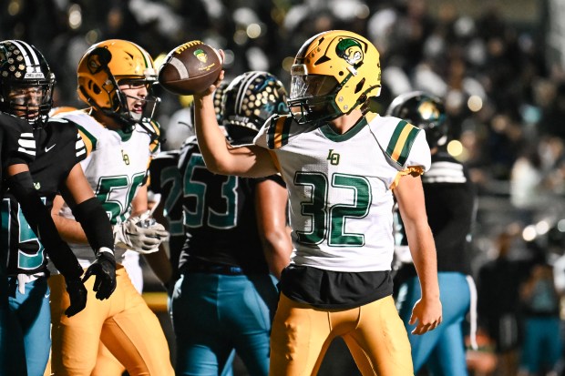 Live Oak's Anden Rogers (32) scores a touchdown during the 2nd half of the Live Oak vs Christopher BVAL high school football game at Christopher High School in Gilroy, Calif., on Friday, Nov. 3, 2022. (Thien-An Truong for Bay Area News Group)