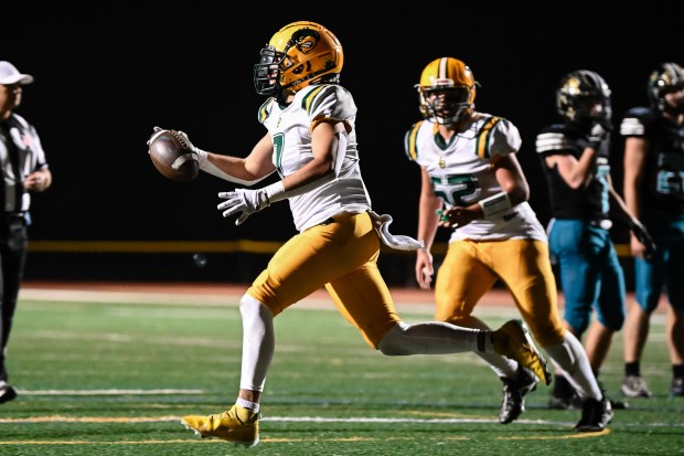 Live Oak's Zach Rocha (7) celebrates after making an interception in the end zone during the 2nd half of the Live Oak vs Christopher BVAL high school football game at Christopher High School in Gilroy, Calif., on Friday, Nov. 3, 2022. (Thien-An Truong for Bay Area News Group)