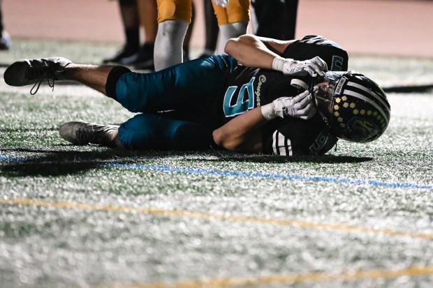 Christopher's Saed Mustafa (9) lays on the field after dropping a crucial pass in the final second of the game during the 2nd half of the Live Oak vs Christopher BVAL high school football game at Christopher High School in Gilroy, Calif., on Friday, Nov. 3, 2022. (Thien-An Truong for Bay Area News Group)