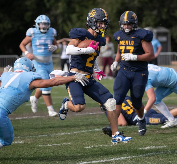 Menlo School's Nicholas Scacco (2) runs the ball against Hillsdale in the first quarter at Menlo School on Friday, Oct. 13, 2023, in Atherton, Calif. (Photo by Jim Gensheimer)