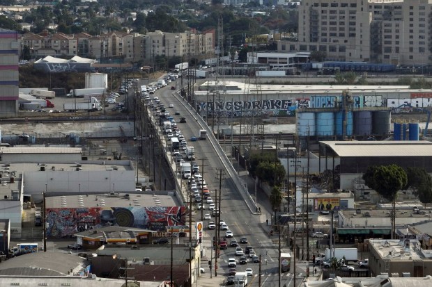 In this aerial view, traffic is backed up near a closed interstate 10 in the aftermath of a fire, Monday, Nov. 13, 2023, in Los Angeles. Los Angeles drivers are being tested in their first commute since a weekend fire that closed a major elevated interstate near downtown. (AP Photo/Jae C. Hong)