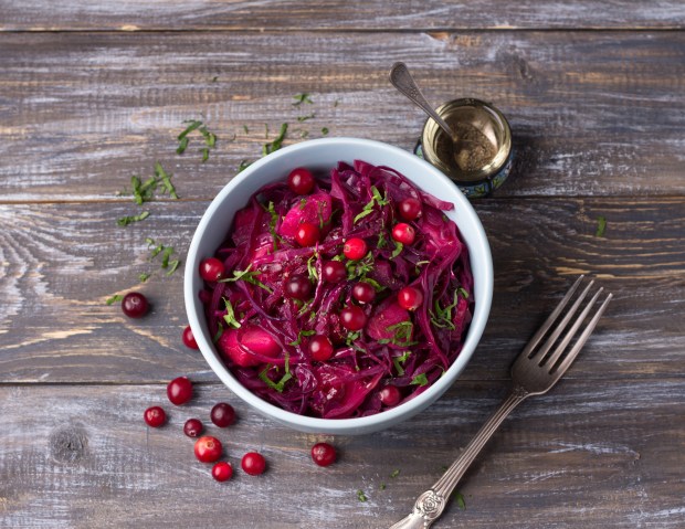 Braised red cabbage is made festive with fresh apples and cranberries for this Thanksgiving side dish. (Getty Images)