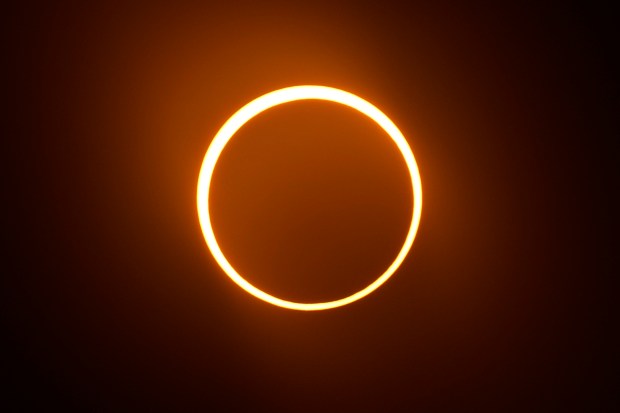 The moon moves in front of the sun during an annular solar eclipse, or ring of fire, Saturday, Oct. 14, 2023, as seen from San Antonio. (AP Photo/Eric Gay)
