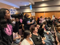 Over the course of the evening, students and teachers shouted down board president Peter Oshinski, threatened to go on a hunger strike, and reduced Superintendent Michael McLaughin to bargaining–and even begging–for the crowd to allow the meeting to continue. 