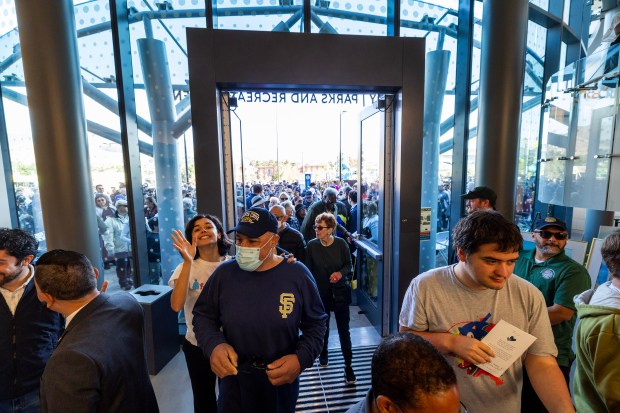 The doors swing open at the grand opening of the new Library and Parks and Recreation Center, Saturday, Oct. 28, 2023, in South San Francisco, Calif. (Karl Mondon/Bay Area News Group)