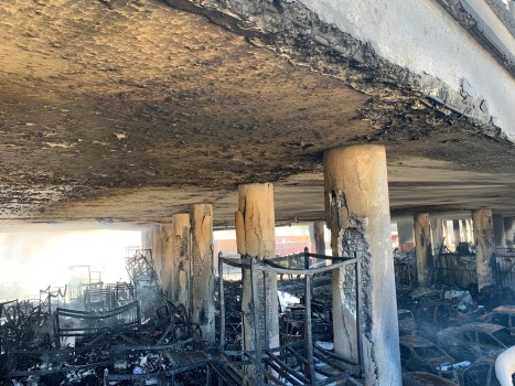 This photo provided by the California Department of Transportation shows the damage of columns from an intense fire under Interstate 10 that severely damaged the overpass in an industrial zone near downtown Los Angeles on Saturday.