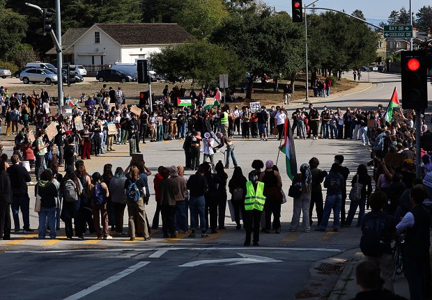 Hundreds of UC Santa Cruz students fill the roadway on Thursday to protest the war in Gaza. (Shmuel Thaler - Santa Cruz Sentinel)